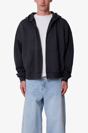 SUDADERA CON CAPUCHA Y CREMALLERA TEJIDO GRUESO · NEGRO LAVADO
