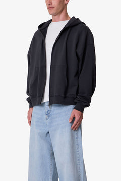 SUDADERA CON CAPUCHA Y CREMALLERA TEJIDO GRUESO · NEGRO LAVADO