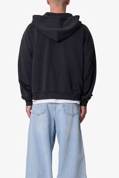 SUDADERA CON CAPUCHA Y CREMALLERA TEJIDO GRUESO · NEGRO LAVADO