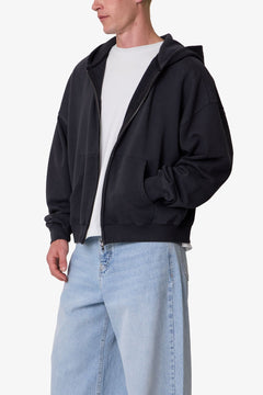 SUDADERA CON CAPUCHA Y CREMALLERA TEJIDO GRUESO · NEGRO LAVADO