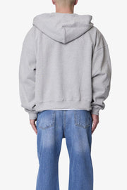 SUDADERA GRUESA GRIS JASPEADA CON CAPUCHA Y CIERRE