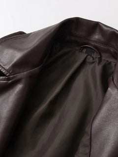 CHAQUETA MOTERA VINTAGE IMITACIÓN CUERO · CINTURÓN AJUSTABLE