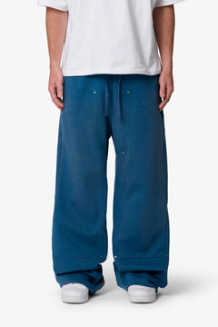 PANTALONES DE CHÁNDAL WEST DOBLE RODILLA · AZUL OSCURO