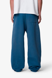 PANTALONES DE CHÁNDAL WEST DOBLE RODILLA · AZUL OSCURO