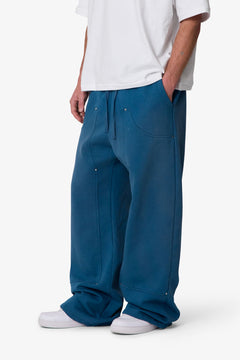PANTALONES DE CHÁNDAL WEST DOBLE RODILLA · AZUL OSCURO